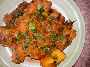 Yam porridge being served in a plate