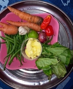 A tray containing the needed ingredients for the preparation of codfish with lemon butter sauce