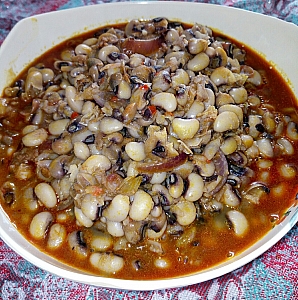 Photo of Beans porridge being served in a plate Beans porridge being served in a plate