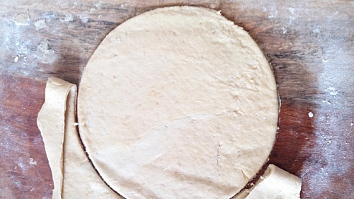 Photo of You will need to be careful while lifting your tortilla from the board, it can become messy while on this process, it is best to work with flour You will need to be careful while lifting your tortilla from the board, it can become messy while on this process, it is best to work with flour