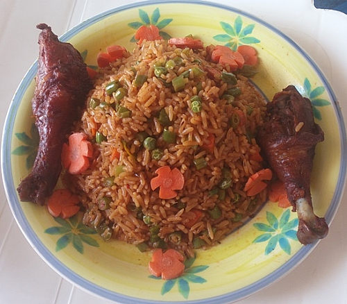Party jollof rice is served with fried chicken