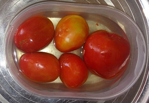 In blanching the tomatoes, you will be able to peel the skin off easily