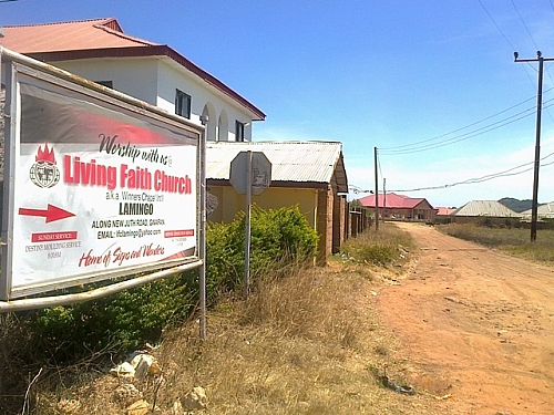 Living Faith Church Sign post by White House, Lamingo