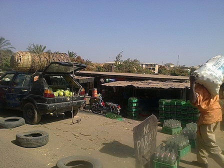 A car with Water melons with Oranges about to be uploaded in Farin Gada market. Fruits, Vegetables and some Food stuff are very cheap in this market compared to other places in Jos