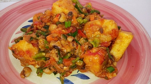 Beans and yam porridge with different vegetables