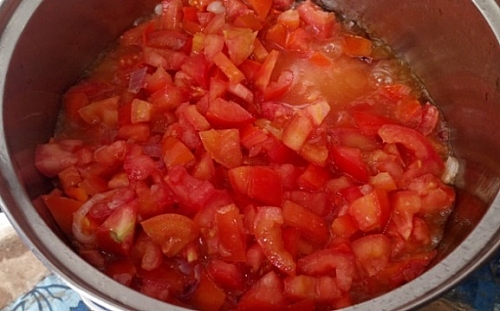 Photo of Frying of chopped tomato Frying of chopped tomato