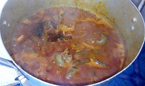 The soup is stirred and then left to simmer