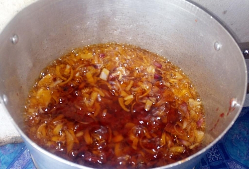 Photo of Process of frying tomato paste for fish stew Process of frying tomato paste for fish stew
