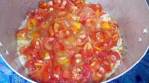 frying of chopped tomato for red beans and rice recipe