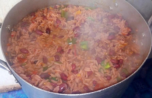 If the liquid dries while the rice is not yet cooked, you can add more water to it to enable it cook properly