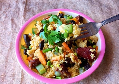 Spicy couscous salad served with parsley