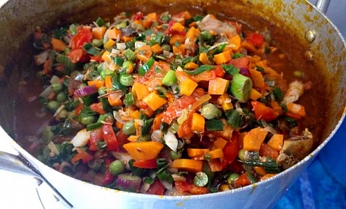 Vegetables are being added to the sweet potato and White kidney beans porridge, they add more beautiful colour to the porridge