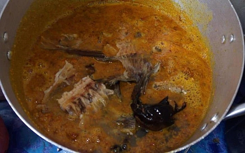 The broth (water) `and fish should be added once egusi is properly fried