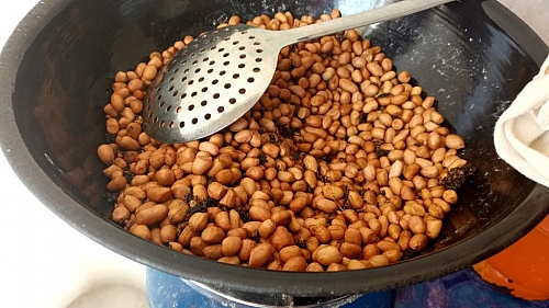 Frying process of peanuts/groundnut- You can reduce your heat when it