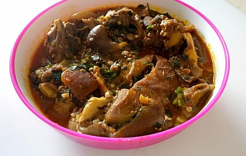 A plate of delicious ogbono soup made with okra and uziza leaves