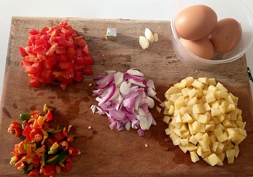 Photo of Simple ingredients for making egg and potatoes recipe Simple ingredients for making egg and potatoes recipe