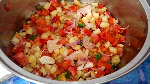 After adding the diced tomatoes and peppers, cover the lid and give the veggies time to cook through