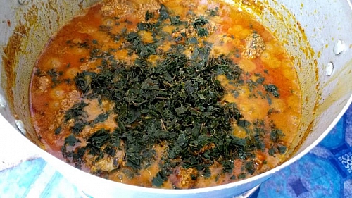 Bitter leaves are added to the soup, you can use uziza instead