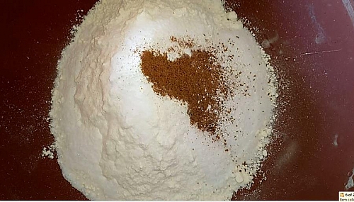 Combining of dry ingredients to the flour make chin chin