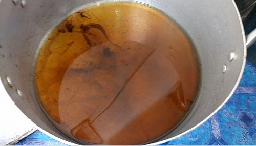 Photo of This is what the bleached palm oil should like after 10 minutes, transparent in colour This is what the bleached palm oil should like after 10 minutes, transparent in colour