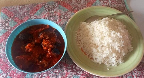 Buka stew is served with boiled rice. Enjoy your meal