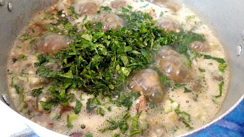 Add the leaf to garnish the soup and let it cook for few minutes
