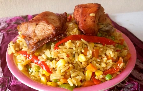 Coconut fried rice served with fried chicken