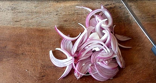 Chop onion into long strips