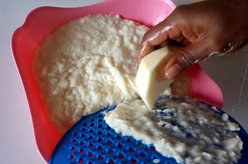 Grating water yam for ojojo