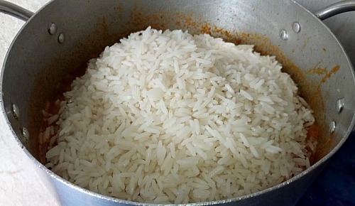 Now add in the parboiled rice and mix