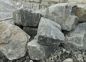 Black basalt rock, an example of extrusive igneous rock