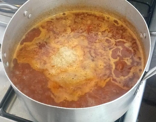 Photo of The water should be slightly above the rice The water should be slightly above the rice