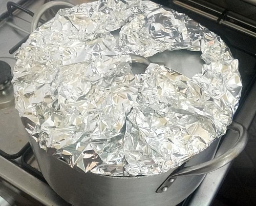 I usually wrap a foil over the pot to trap in heat. In this case, the rice doesn