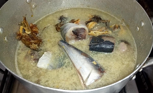 It is best to add the fish when the harder meat is almost cooked, in this way, the fish won;t scatter in the soup while stirring
