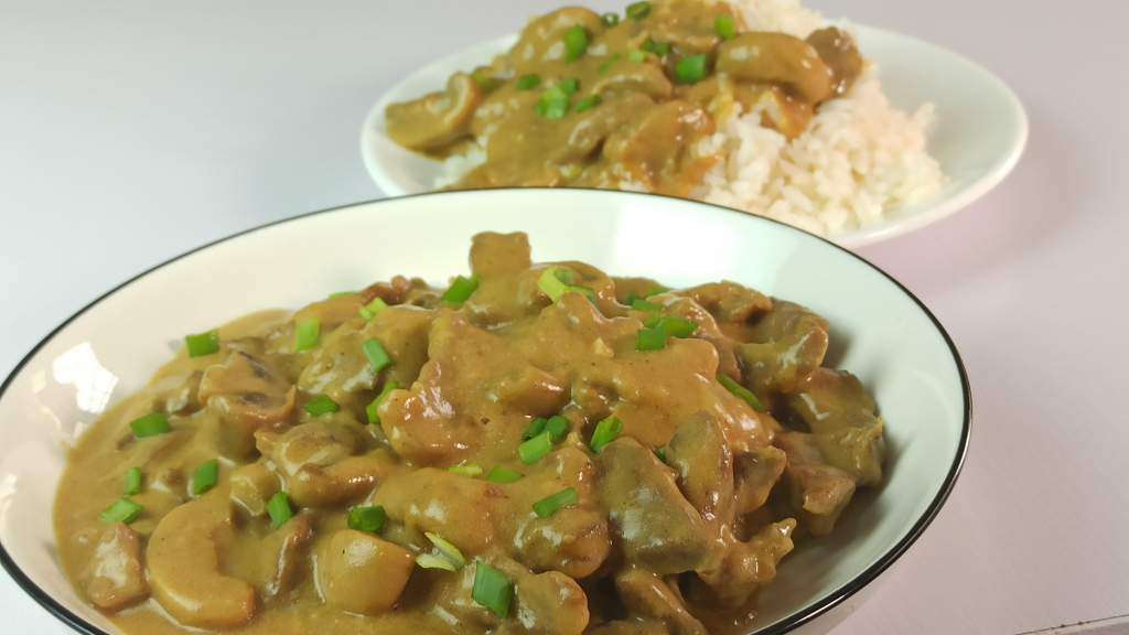 Beef Stroganoff served with cooked white rice