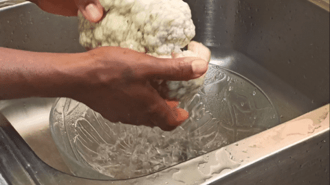 wash the cauliflower over running water