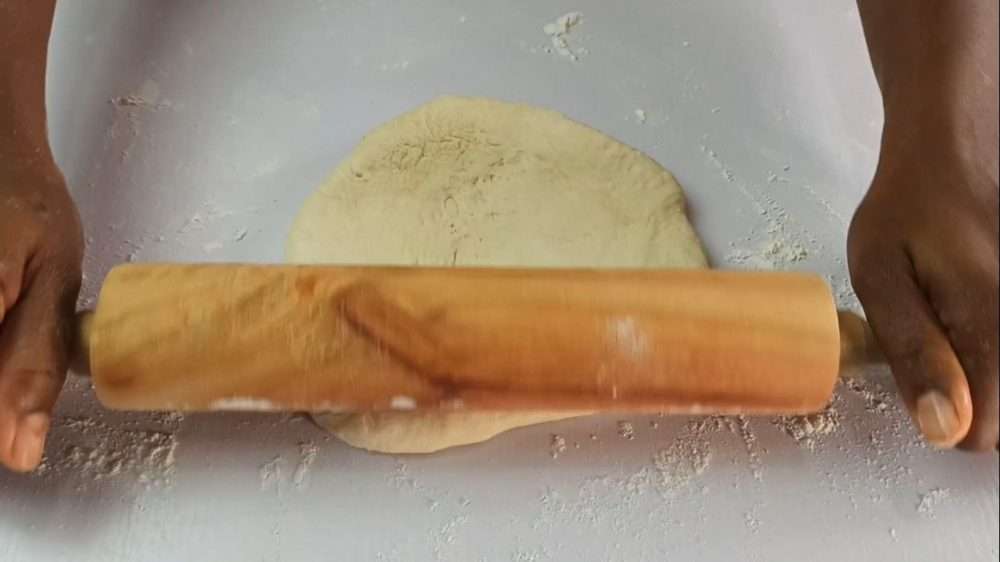 Rolling pizza dough