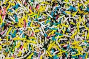 Colored material of shredded paper for mulching